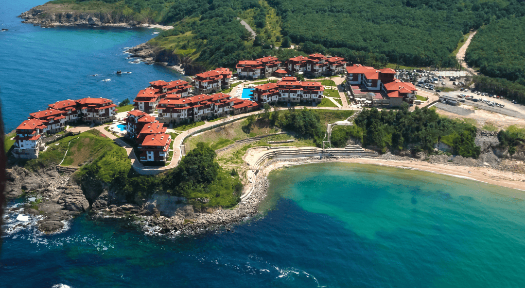 Aerial view of Sozopol, Bulgaria with coastal villas and clear blue sea – a budget-friendly summer destination in Eastern Europe