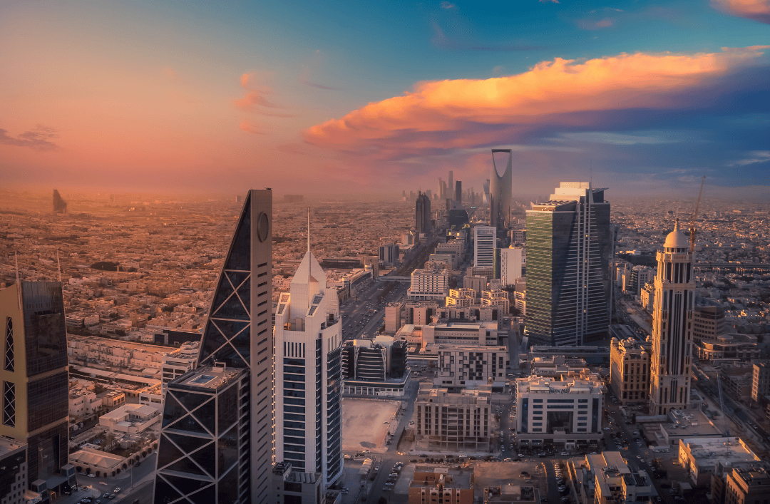 Riyadh city skyline at sunset with iconic skyscrapers and dramatic desert horizon – ideal view on a Saudi Arabia trip
