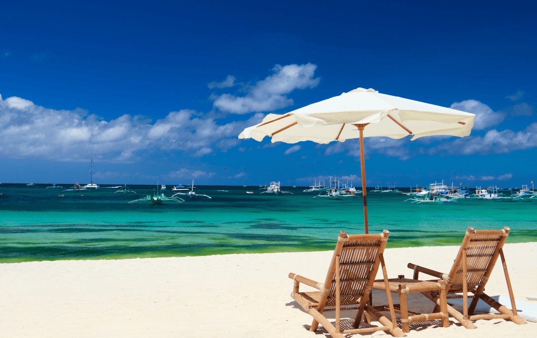 White sand beach and turquoise waters—perfect tropical escape in Europe for summer vacation 2025.