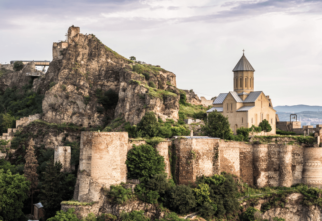 Historic Narikala Fortress and St. Nicholas Church in Tbilisi, Georgia, iconic landmark overlooking the old town.